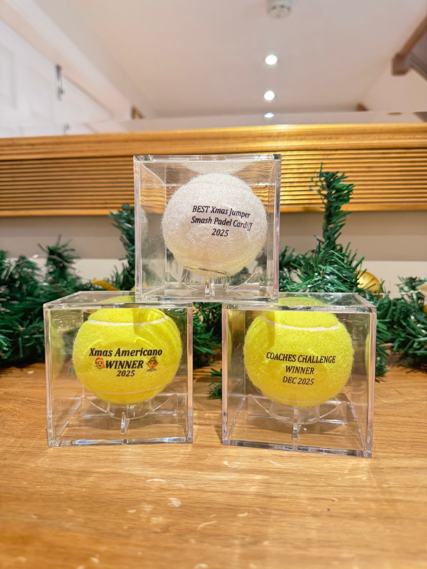 Namethatball - Custom tennis ball in trophy case